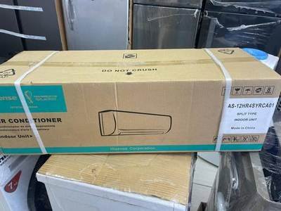 Hisense 12,000 BTU indoor — air conditioner held by LAMM Investment Company.