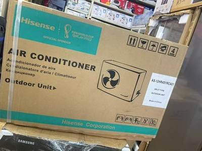 Hisense 12,000 BTU outdoor — air conditioner held by LAMM Investment Company.