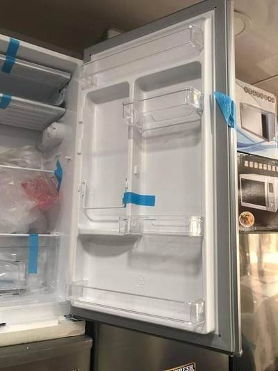 Roch door shelves — refrigerator held by LAMM Investment Company.